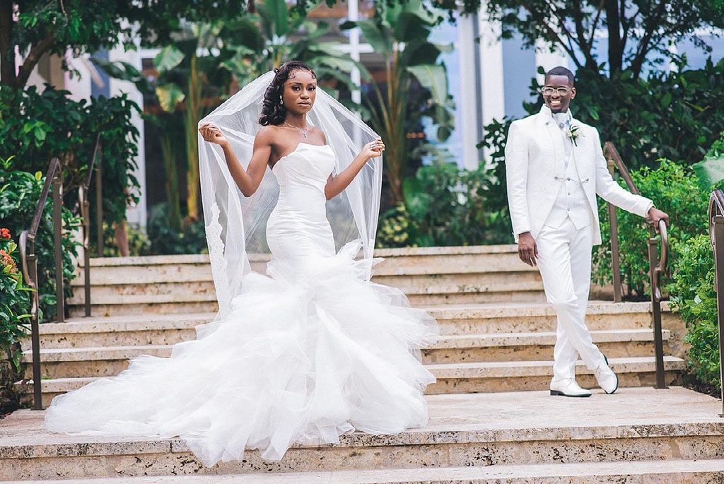 Couple photographed in a Nassau garden